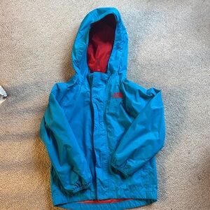 The North Face Kids Blue Raincoat with Red Interior